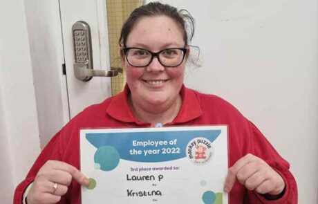 Nursery employee receiving award